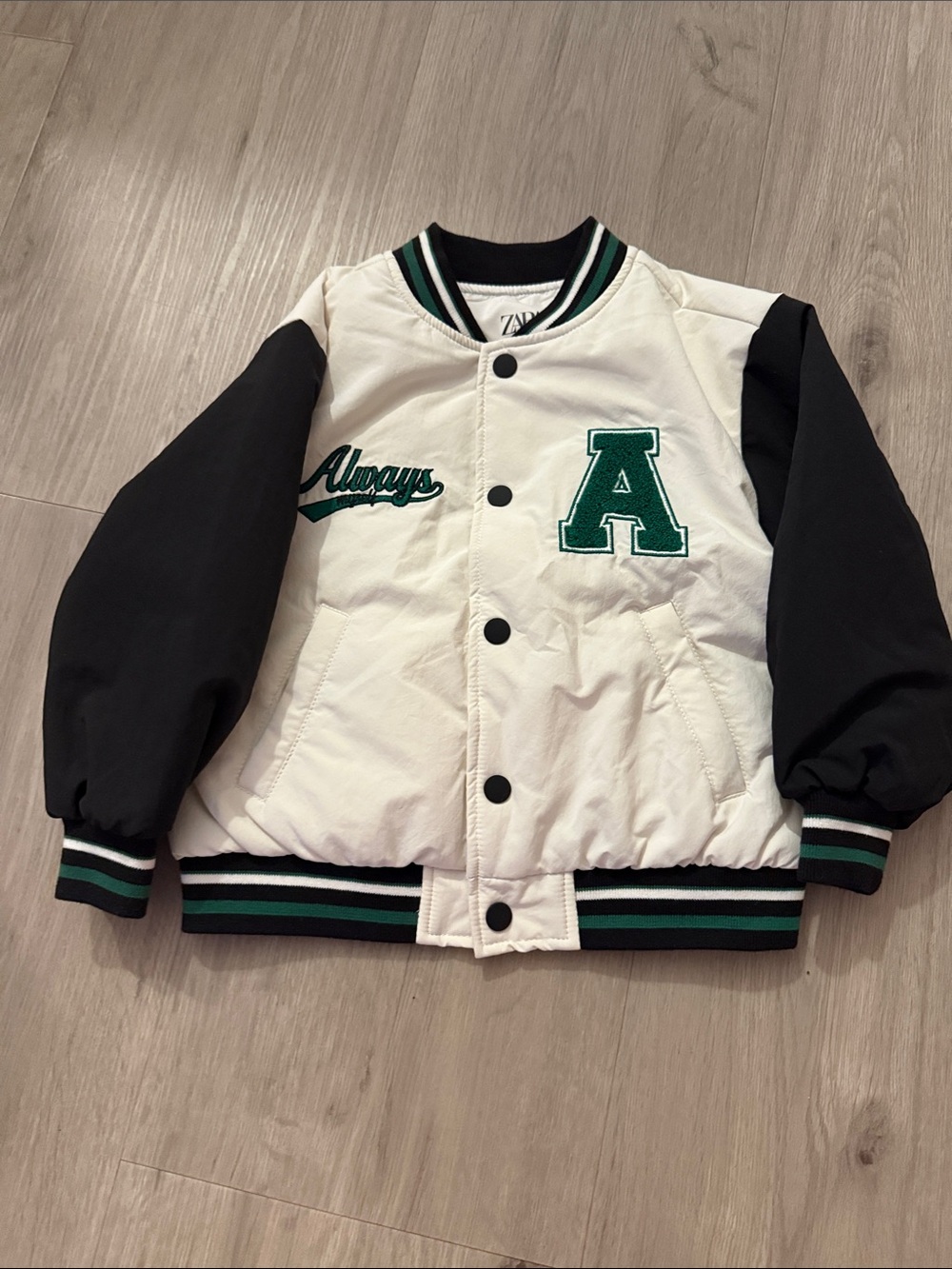 Zara Kids White and Black Varsity Jacket with Green Accents
